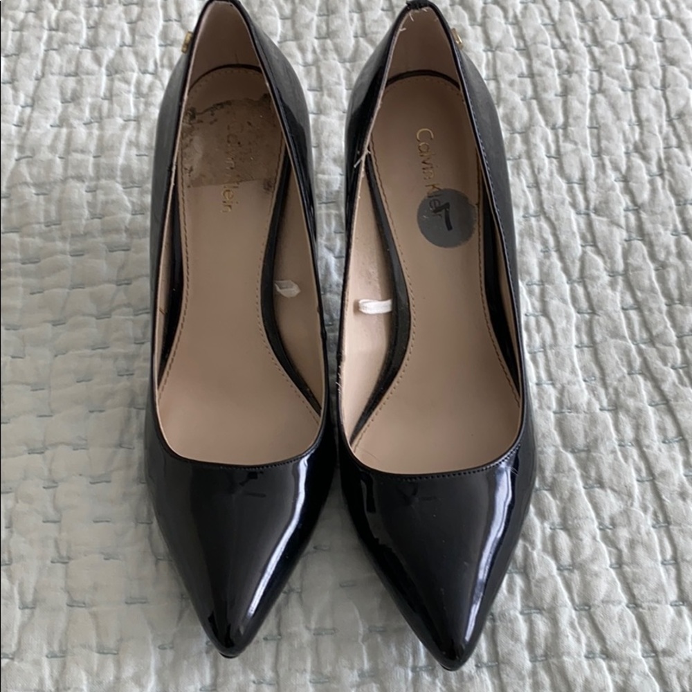 Calvin Klein black patten leather pumps